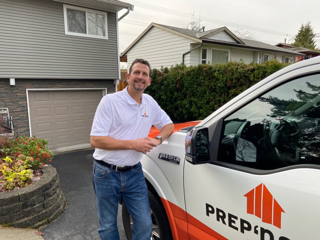 Prep'n Sell Langley's trusted branded truck in front of a newly staged home ready for sale
