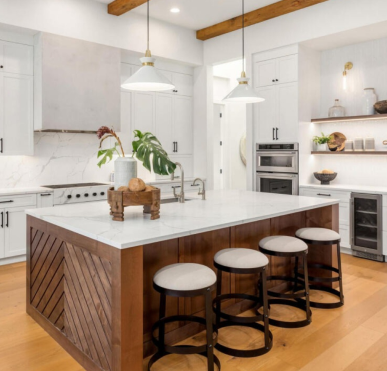 A stylish, renovated kitchen with contemporary finishes and a breakfast bar.